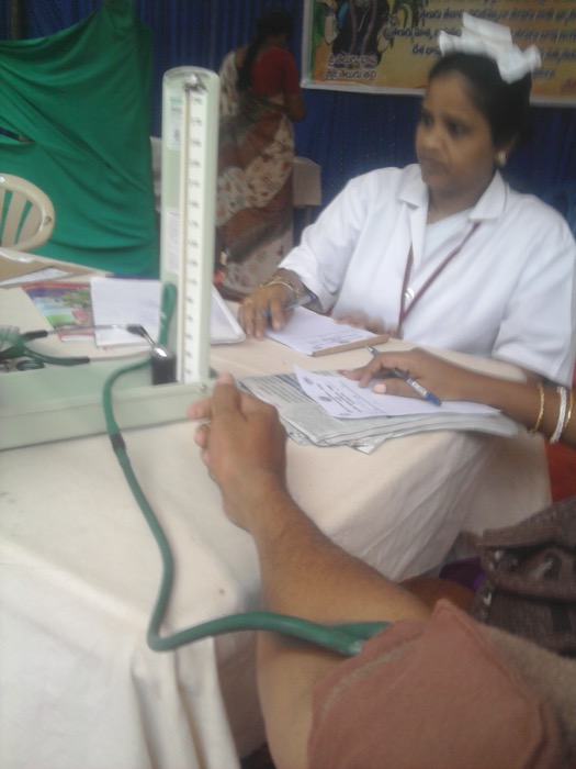 Blood pressure being measured with a mercury sphygmomanometer