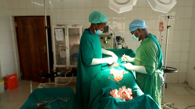 A caesarean section being performed in an operating theatre