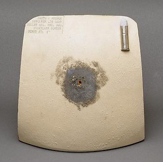 Test card fired at close range showing blackening