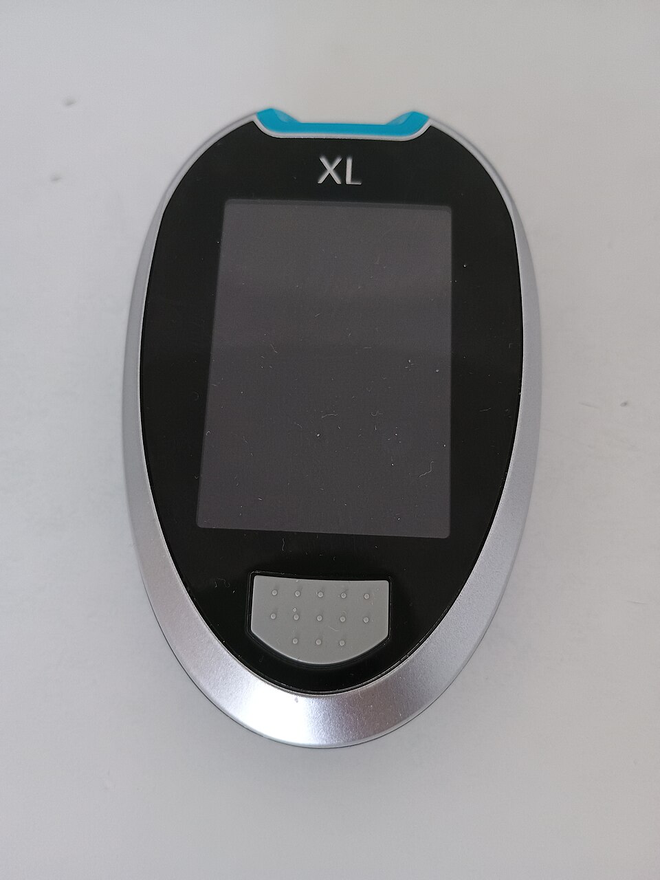 A handheld
  blood glucose meter